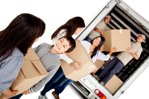 Local home move support in Romford with household furniture and boxes ready for transport
