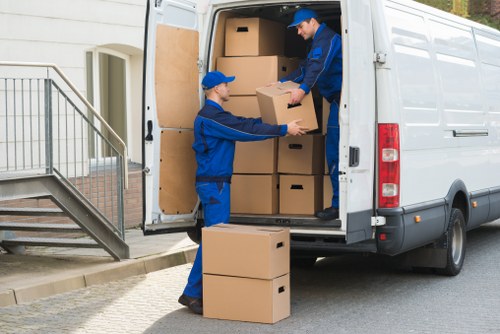 A professional removals team supporting a house move in Romford