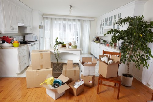 Packed household items ready for transport with a Romford man and van