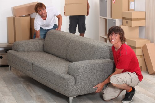 Office furniture and equipment being prepared for a business move