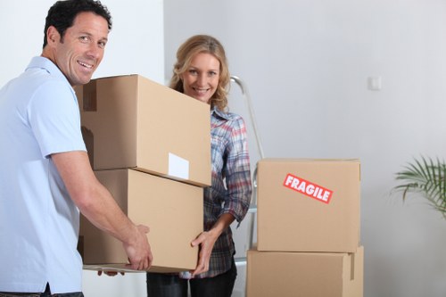 Removalists loading boxes and furniture for a Romford home relocation